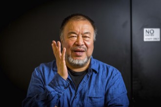 DEU Germany Germany Berlin The Chinese artist Ai Weiwei in his studio in the vaulted cellar of the