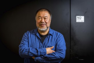 DEU Germany Germany Berlin The Chinese artist Ai Weiwei in his studio in the vaulted cellar of the