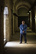 DEU Germany Germany Berlin The Chinese artist Ai Weiwei in his studio in the vaulted cellar of the