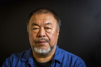 DEU Germany Germany Berlin The Chinese artist Ai Weiwei in his studio in the vaulted cellar of the