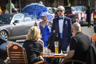DEU Germany Germany Berlin An elderly couple in luxury clothing on their way to the opera