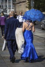 DEU Germany Germany Berlin An elderly couple in luxury clothing on their way to the opera