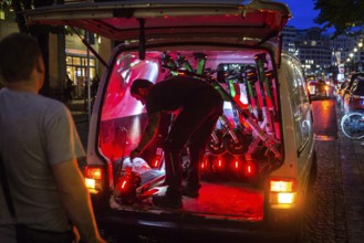 DEU Germany Germany Berlin So-called juicers collect discharged electric scooters at Potsdamer