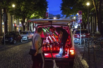 DEU Germany Germany Berlin So-called juicers collect discharged electric scooters at Potsdamer