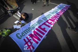 DEU Germany Germany Berlin Demonstration against rent increases and gentrification.child paints in