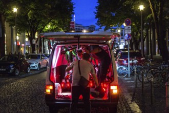 DEU Germany Germany Berlin So-called juicers collect discharged electric scooters at Potsdamer