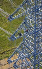 Aerial photo, construction power line Dortmund-Hagen, climber in power pylon, worker, height
