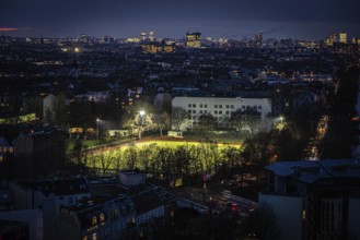 DEU Germany Germany Berlin Floodlights illuminate a sports field in Kreuzkölln