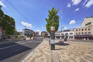 Stele with location sign, traffic area, roads, square, road construction, tram tracks, overhead