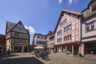 Historic half-timbered houses, general architecture, buildings, paving stone square, bicycles,