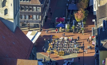 Aerial view, Evangelische Pauluskirche, outdoor catering on the market square with pumpkin sales,