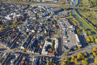 Aerial view, city with construction site demolition and new construction of the western half of the
