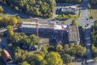 Aerial view, construction site and new building for Autobahn GmbH office buildings, former garden