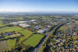 Aerial view, Oberster Kamp industrial estate on the A2 motorway, meadow area surrounded by autumn