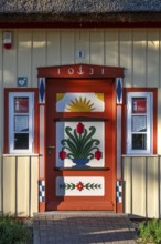 Decorative front door from 1931 on a residential building, Ahrtenshoop, Darß, Mecklenburg-Western