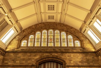 London, United Kingdom - 15 May 2025: Detailed close-up of the beautiful stained glass arched