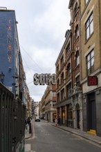 London, United Kingdom - 15 May 2025: The classic London streetscape featuring the iconic soho
