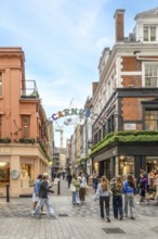 London, United Kingdom - 15 May 2025: Famous Carnaby street colorful sign welcoming visitors to the