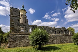 Ruins with a tower along a wall, blue sky with clouds in the background, The Niedeck Ruins in