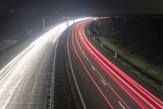 Night traffic on the motorway with light trails, Erfurt, Thuringia, Germany