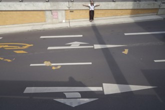Feeling contrast of light and shadow on the street as metaphor for construction dilemma of warm and