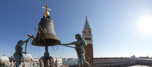 Large-than-life moors at the bell on the Torre dell'Orologio, Clock Tower, St. Mark's Square,