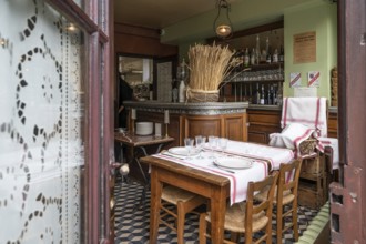 The historic interior of the Auberge Ravoux (Maison de Van Gogh) in Auvers-sur-Oise shows a