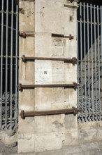 Pillar element made of travertine stone from Colosseum with architectural measure used in the