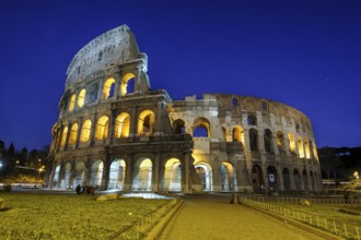 Night view photo in blue hour of historic arena Amphiteatrum Flavium Colosseum Colosseo in ancient