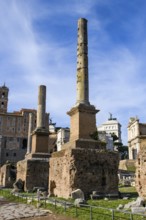 Two honorary columns reconstructed at the Roman Forum in 1899, a fluted from Pavonazetto and an