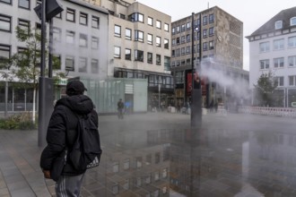 Digital water feature, Blue Cloud water installation on Husemanplatz in downtown Bochum, water mist