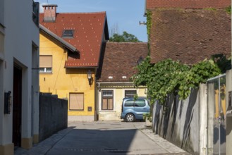 Old crouched houses, car, color contrast, Kranj, Upper Carniola, Slovenia