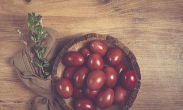 Painted eggs in a wooden bowl, red, painted madder dye, powder from the roots of endro, with onion