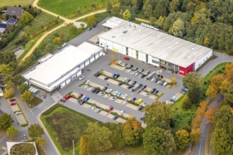 Aerial view, shopping center with Aldi supermarket and Edeka supermarket and parking lot, Bedburg,