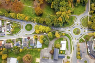Aerial view, two green roundabouts Udemer Straße, autumn trees, Schneppenbaum, Bedburg-Hau, Lower