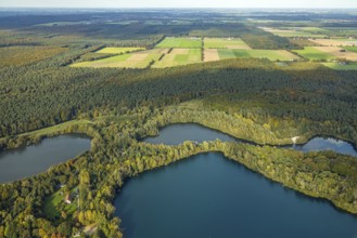 Aerial view, kidney salt arms and mill ponds LSG landscape protection area, forest area and lake,