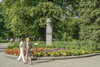 People, leisure, memorial writer Krisjanis Barons, municipal park, Riga, Latvia