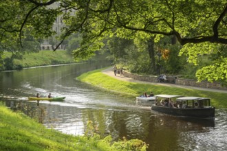 People, leisure, tour boat, pedal boat, kayak, city canal, municipal park, Riga, Latvia