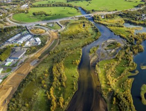 Aerial view, lip embankment, construction site and new building extension and feeder federal road