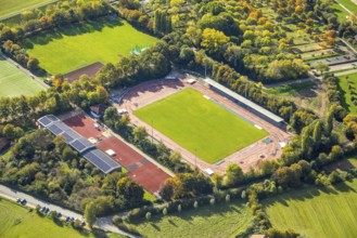 Aerial view, Auestadion Wesel, soccer stadium and athletics stadium, surrounded by autumn trees,
