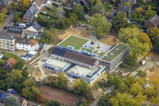 Aerial view, Fusternberg community elementary school construction site, green roof and solar roof,