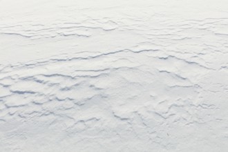 Wind has made patterns on snow surface, Toronsuo National Park, Tammela, Finland