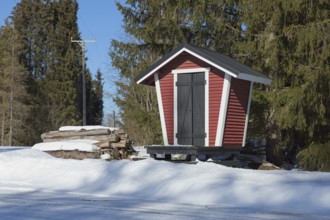 Old traditional wooden, milk dock that were used to hold milk containers to wait for milk delivery