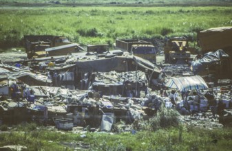 Slum, slum in a swamp area next to a main road, Manila in 1995, Philippines