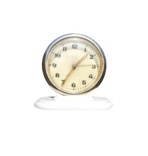 Old soviet antique vintage table clock on a white background