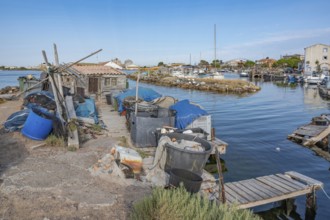 The traditional fishing port of La Pointe Courte with a small wooden shed, fishing nets, baskets