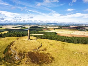 Waterloo Monument over Scottish fields and farms from a drone, Jedburgh, Scotland, UK