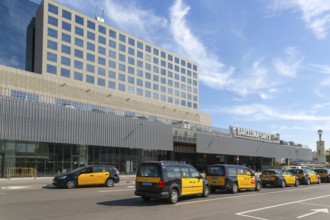 Taxis in street outside Barcelona-Sants railway station building in city centre, Barcelona,