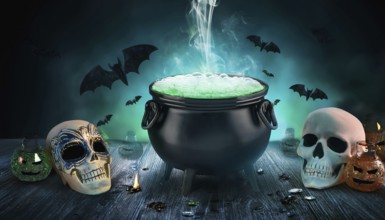 A bubbling cauldron emits green smoke, surrounded by skulls and bats in a spooky Halloween setup.