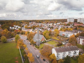 City panorama in autumn with distinctive church tower and colorful landscape, Sindelfingen,